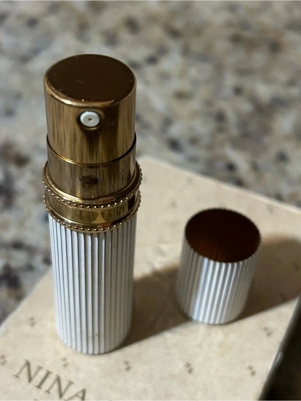 Vintage Nina Ricci White and Gold Ribbed empty bottle purse atomizer